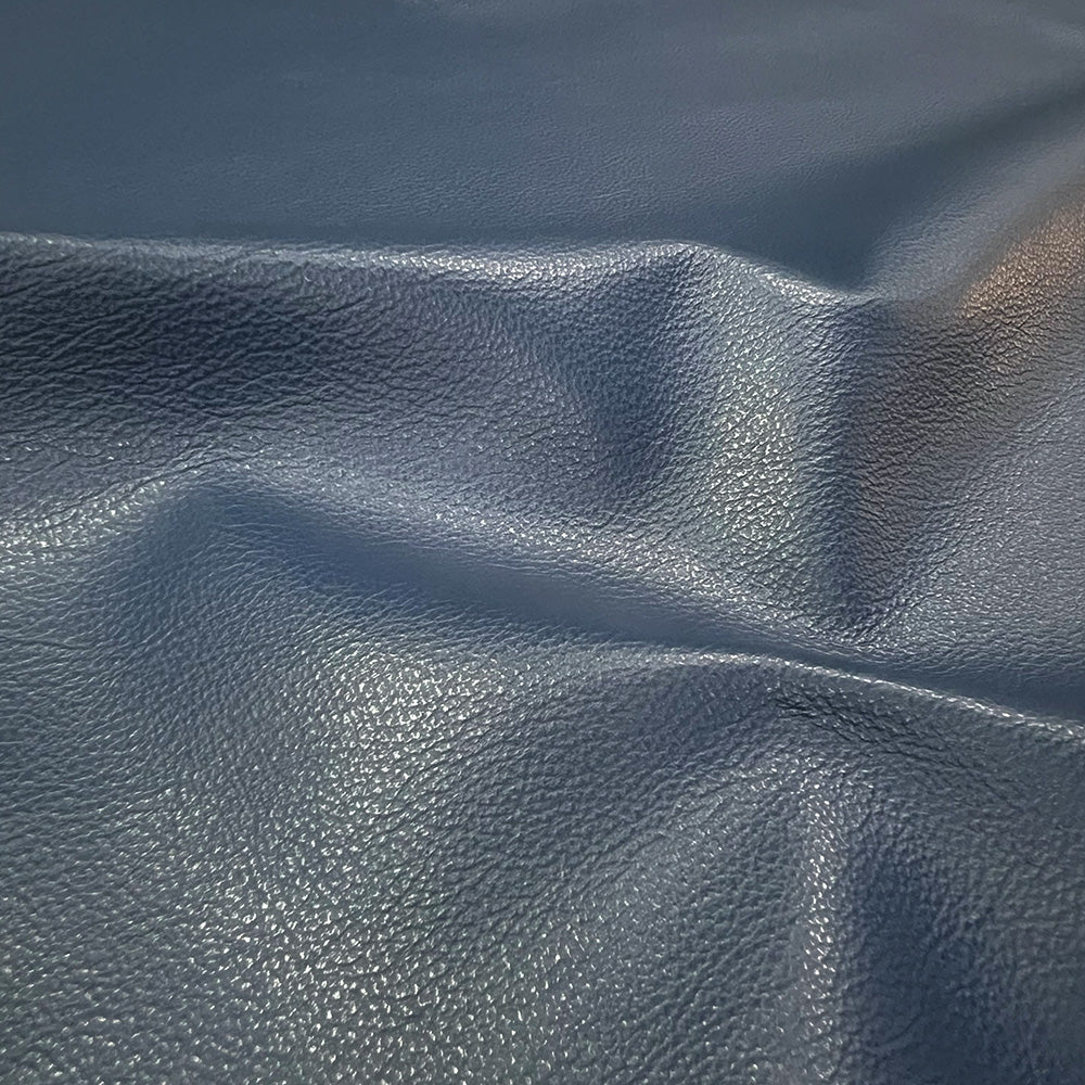 Dent Leather Ottoman - Limited Edition