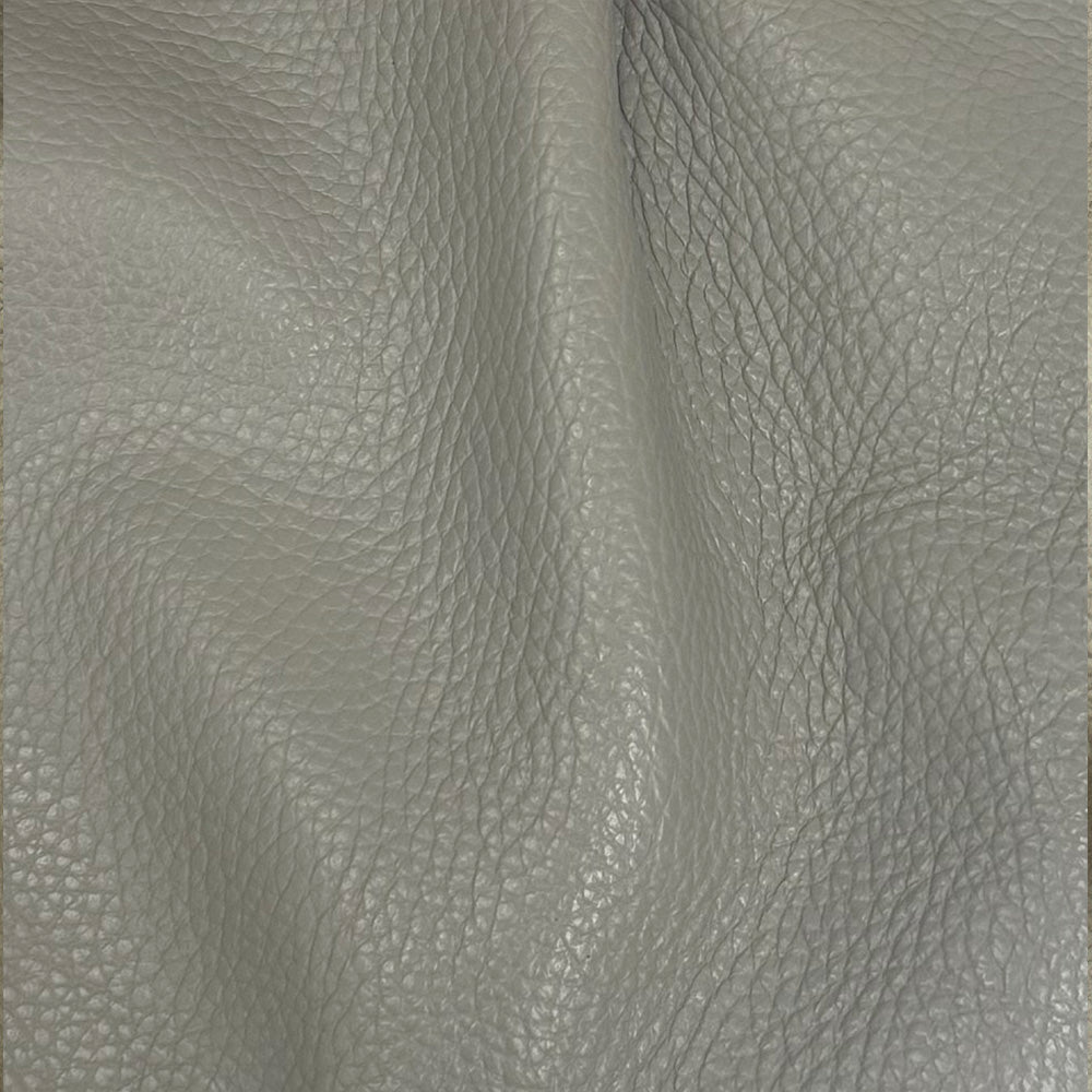 Dent Leather Ottoman - Limited Edition