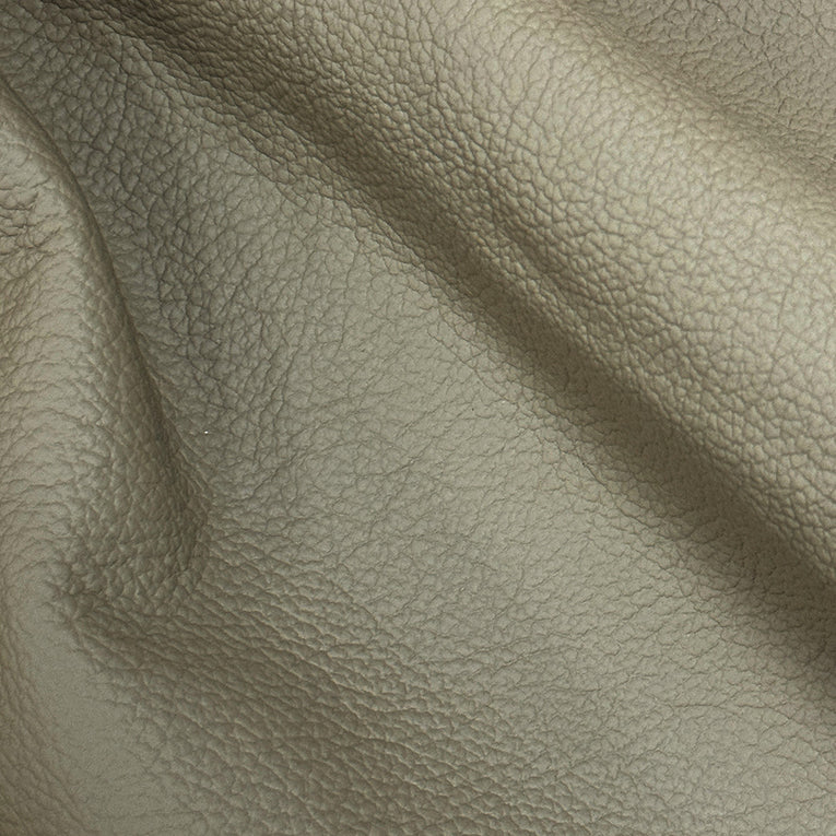Dent Leather Ottoman - Limited Edition